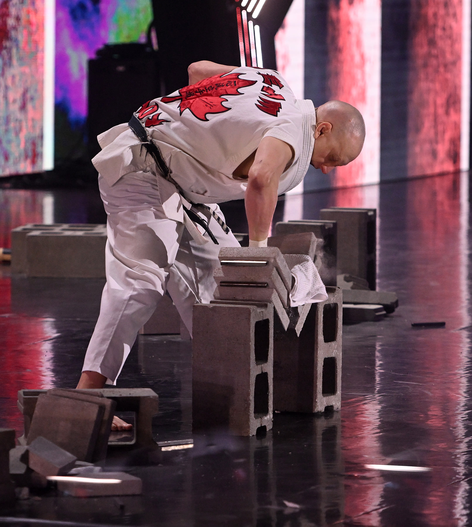 Chucky Mady breaking concrete blocks with an elbow during his 2022 Canada’s Got Talent semi-final performance