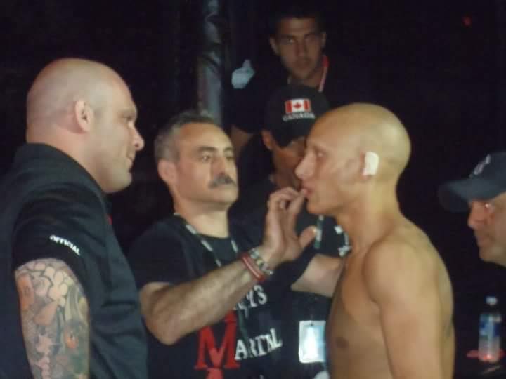 Fighter receiving instructions from his team before a bout