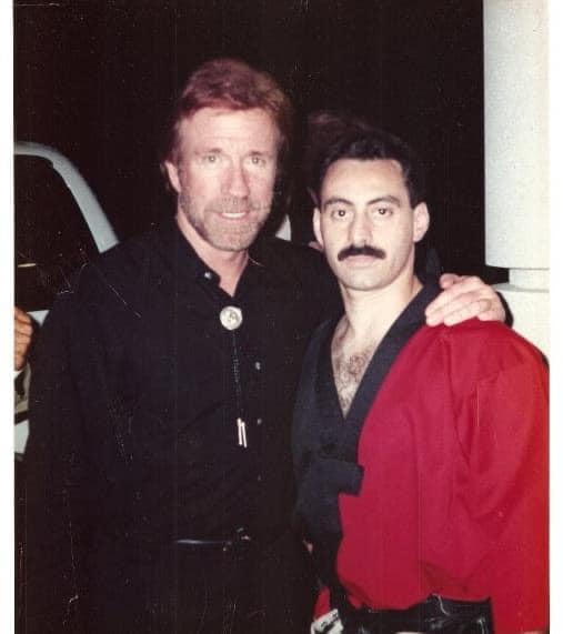 Two men posing together in an archival Mady photograph