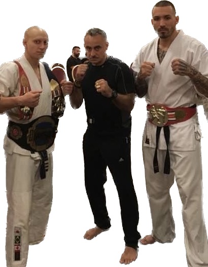 Three martial artists standing together after training
