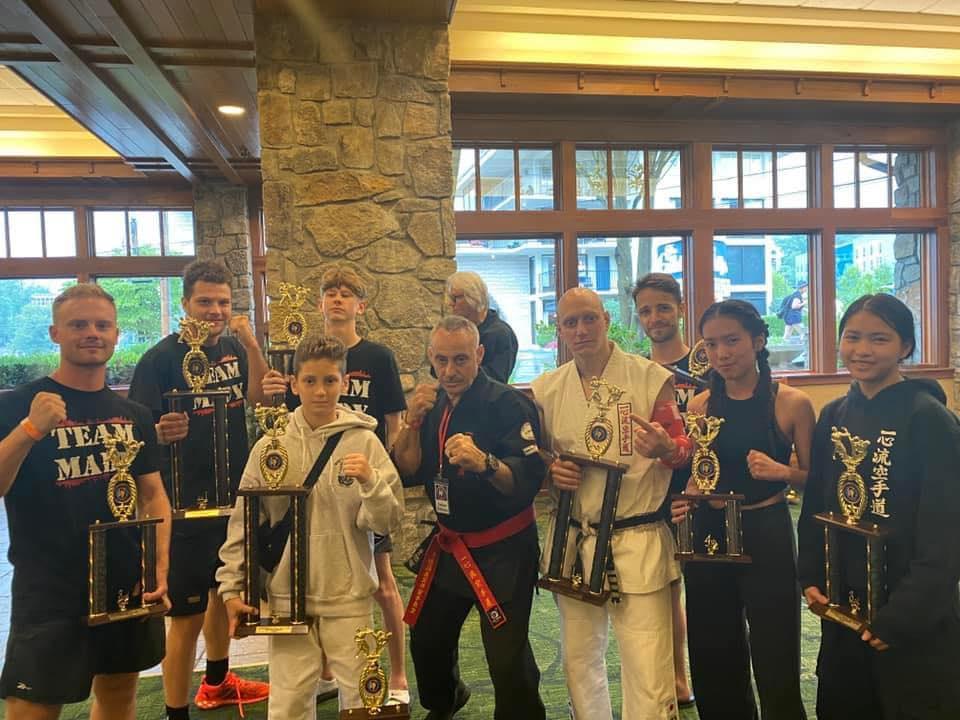 Team Mady competitors gathered together with trophies
