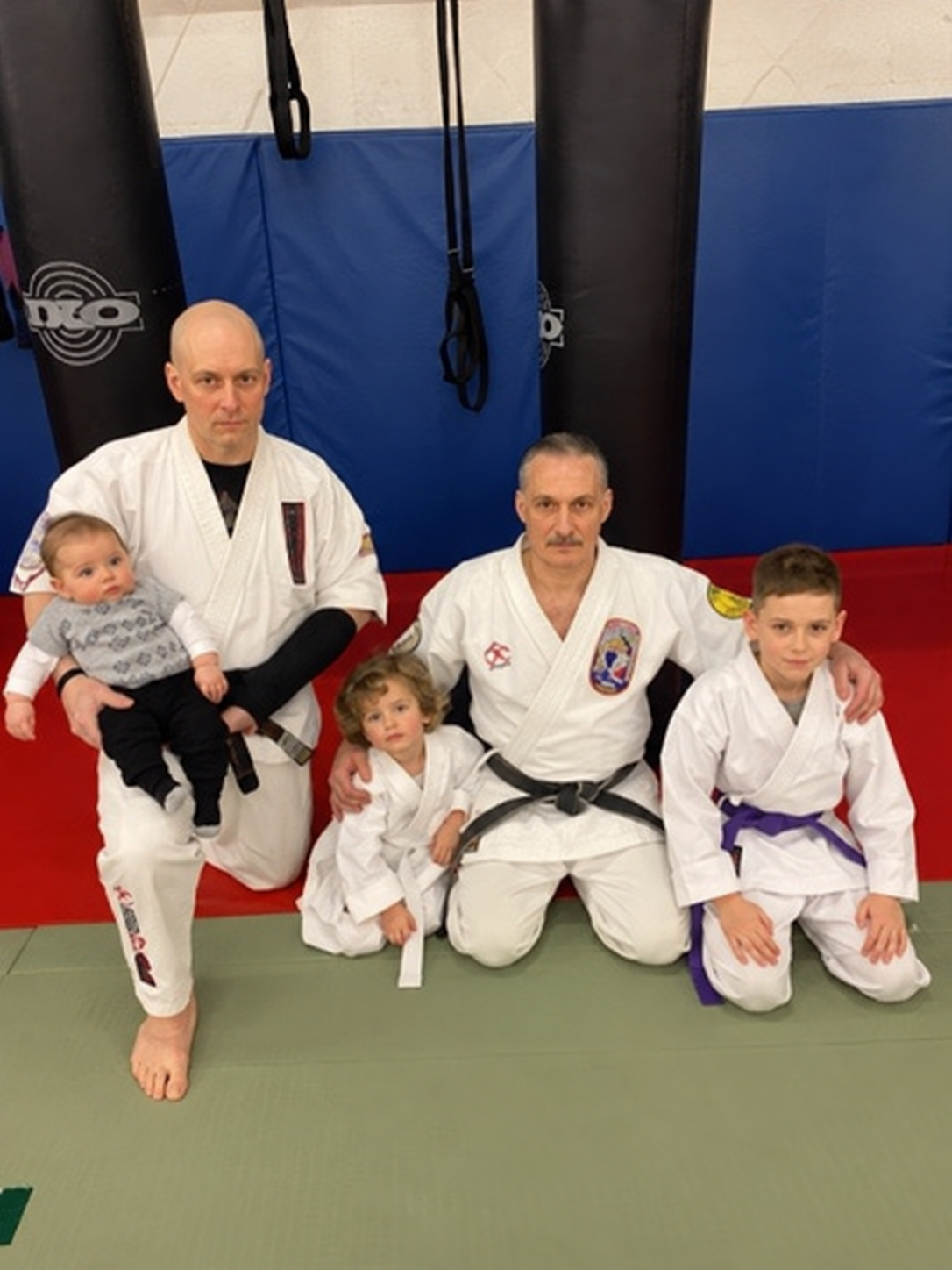 Three generations training together: Albert Mady, his son Chucky and Albert’s grandchildren at the dojo